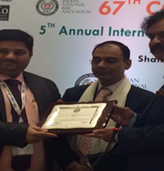 Sanjay Kaushik, MD Netrika receiving the recognition award for his outstanding contribution in the field of Risk Management and Forensics from Honourable Justice.